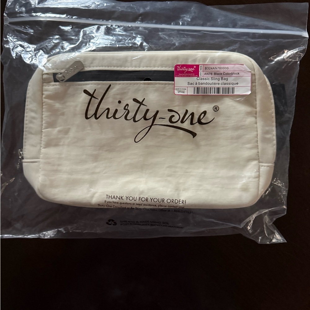 Thirty-One White and Black Clutch